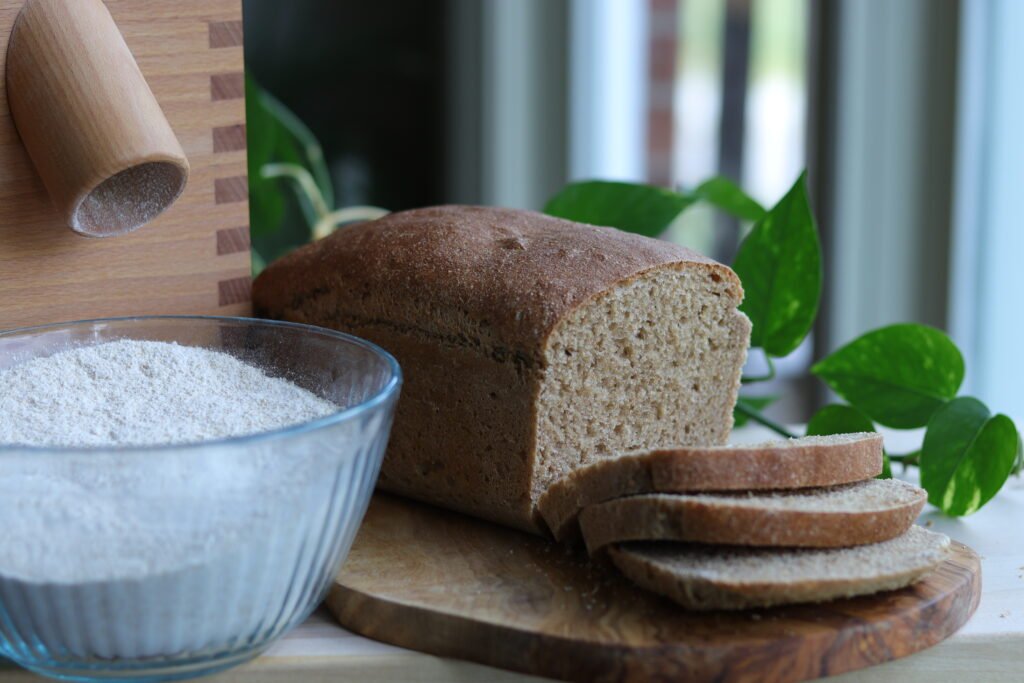 Fresh milled flour bread next to a grain mill, Grains to Greatness Bakery, London KY